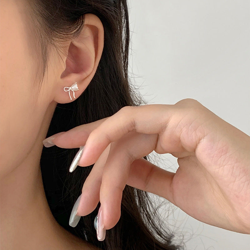 F廠【DQ10390E】S925純銀愛心仿珍珠蝴蝶結耳環女ins風小眾高級感甜美耳飾潮
25.09-3