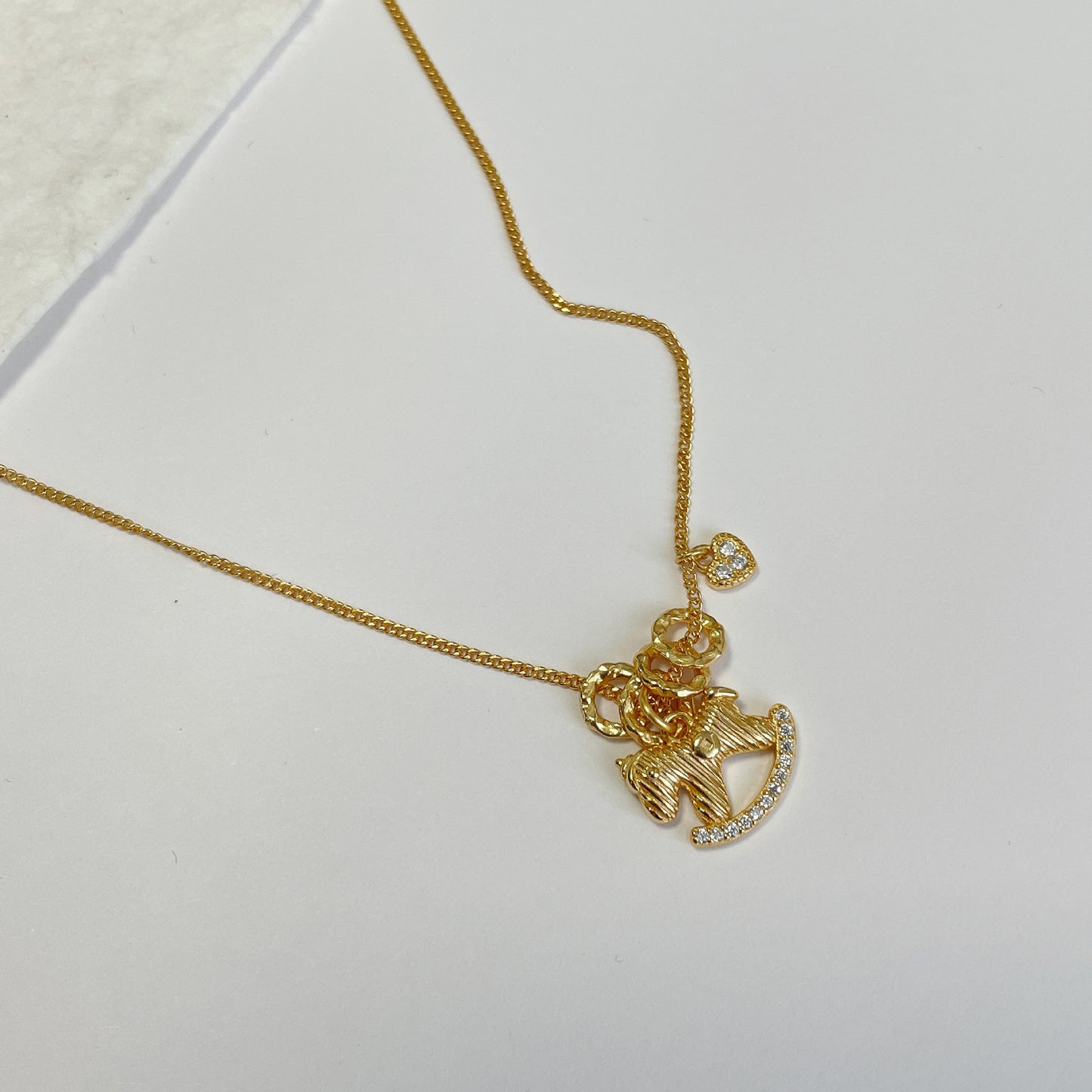 F廠【DQ0270N】S925純銀輕奢木馬銅錢項鍊女高級感條紋搖搖馬愛心跑環鎖骨鏈 25.04-3