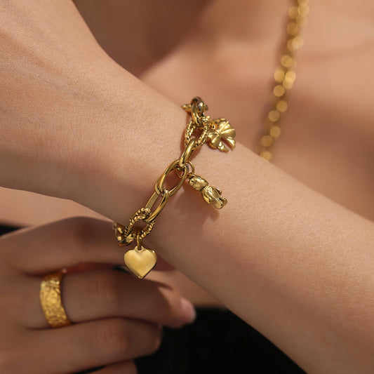 B廠【E605】新款不鏽鋼蝴蝶結愛心多配件吊飾幾何扣圈手鍊PVD鍍金飾品 25.04-4