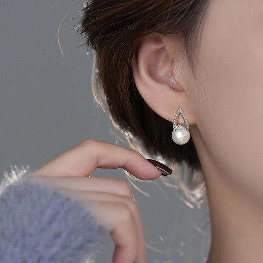 E廠【XDQ11059E】S925純銀輕奢仿珍珠馬蹄耳扣女時尚優雅鑲鑽V型耳環氣質耳飾
26.03-2