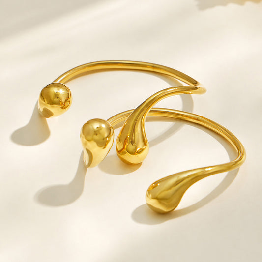 B廠【Z319】時尚新款鈦鋼PVD真空電鍍金色開口水滴不規則手環ins風格簡約飾品女
26.08-1