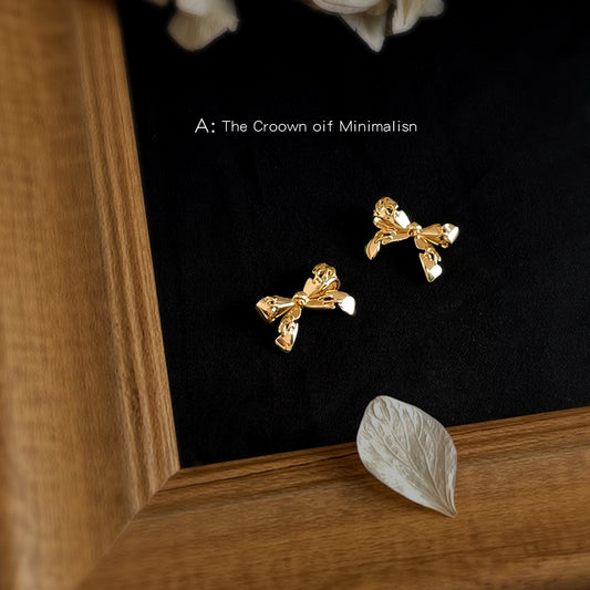 C廠【6653】設計師~原始縫合裂痕蝴蝶結925銀針鍍14K個性ins創意耳環耳飾
 25.08-5