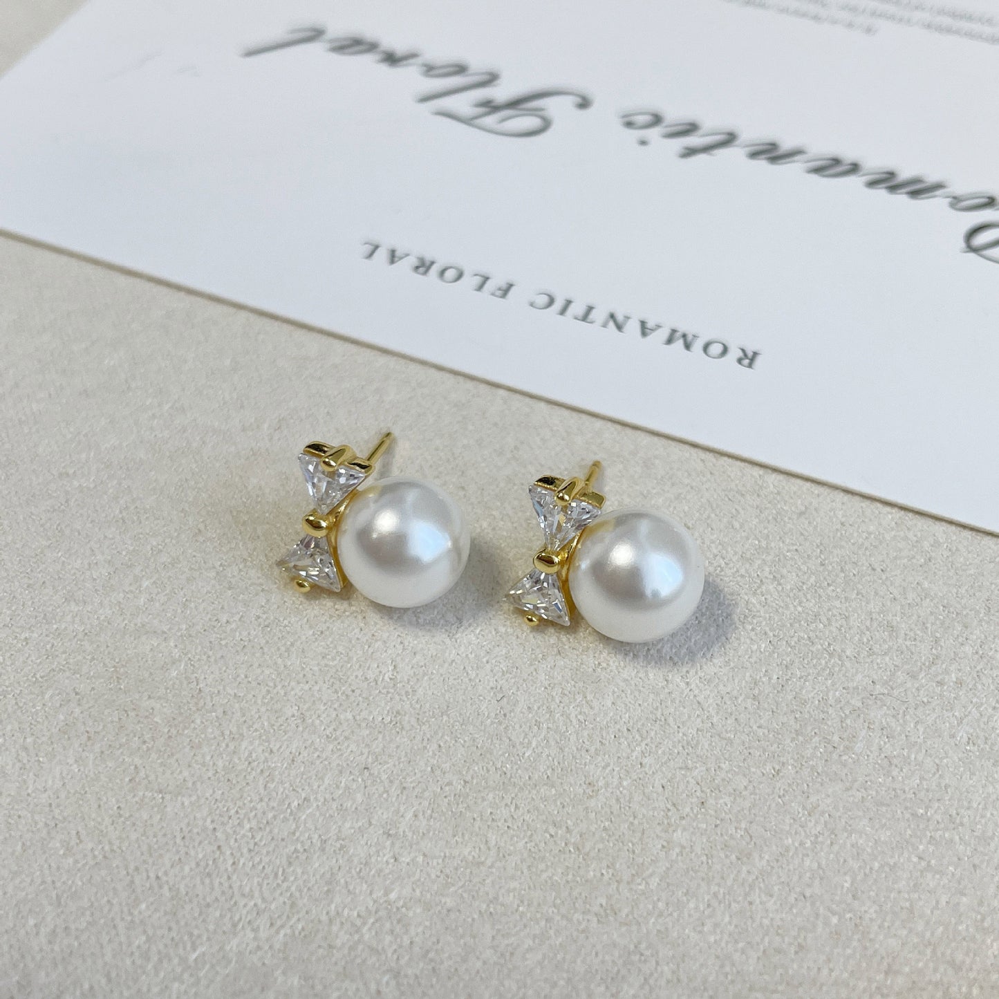 F廠【DQ10864E】日韓時尚蝴蝶結仿珍珠耳環S925純銀小眾高級感鑲閃鋯百搭耳飾 25.03-3