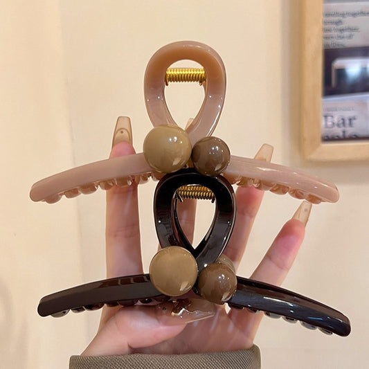 C廠【X141】高品質咖色珠珠抓夾女大號鯊魚夾高級感髮量大盤髮夾2026新款頭飾
26.04-3