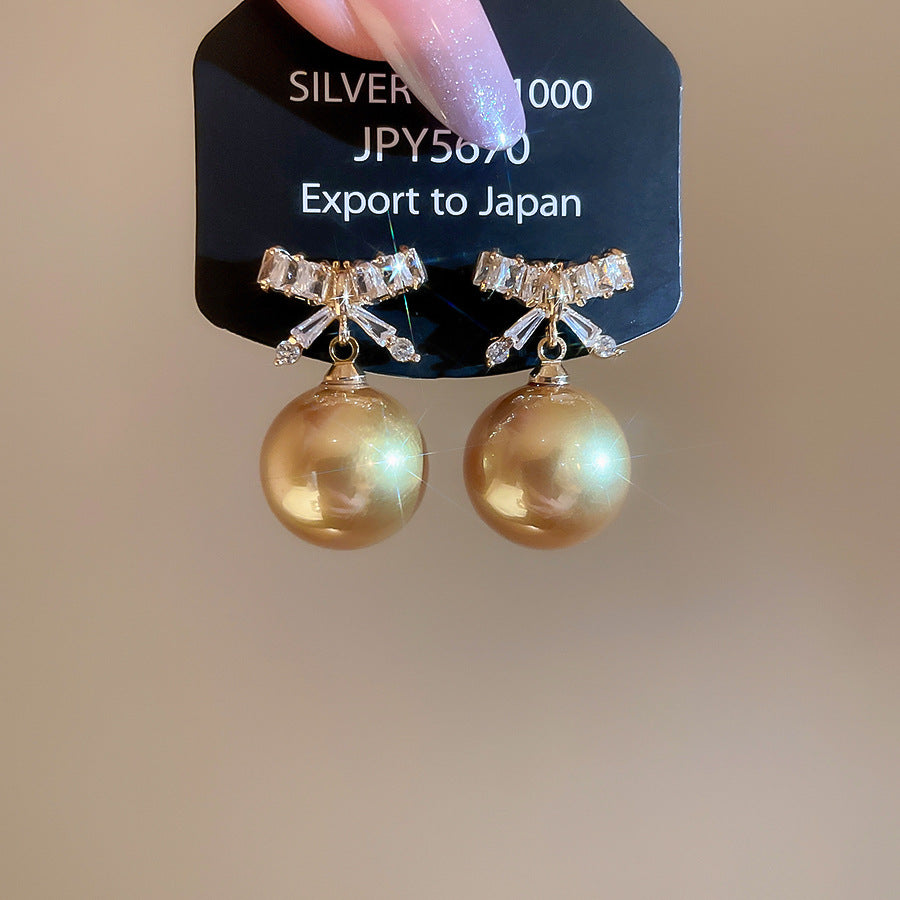 A廠【HE28881】925銀針超閃鋯石蝴蝶結香檳色珍珠耳環優雅氣質耳環輕奢高級感耳飾女
25.10-2