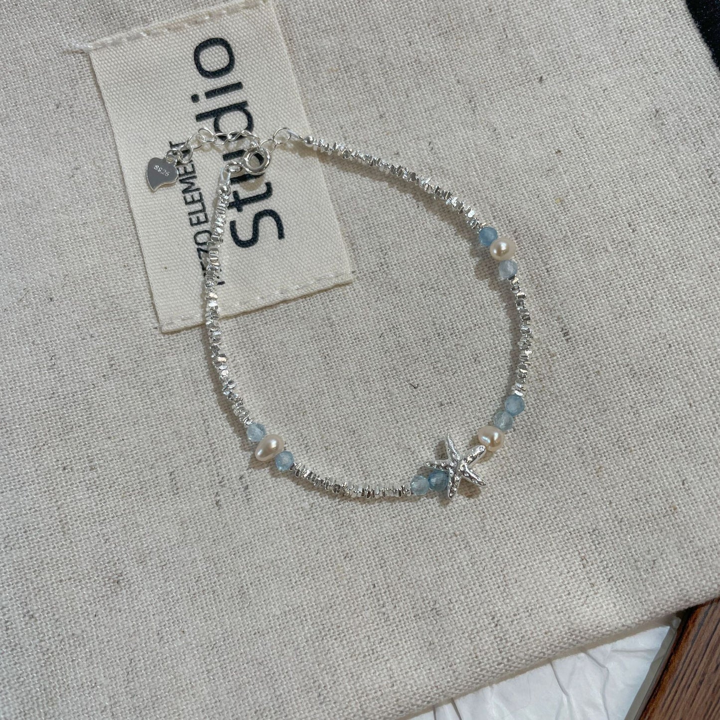 F廠【DQ0084S】簡約不規則海星天然珍珠手鍊女S925純銀海藍寶碎銀子百搭手飾
25.08-5