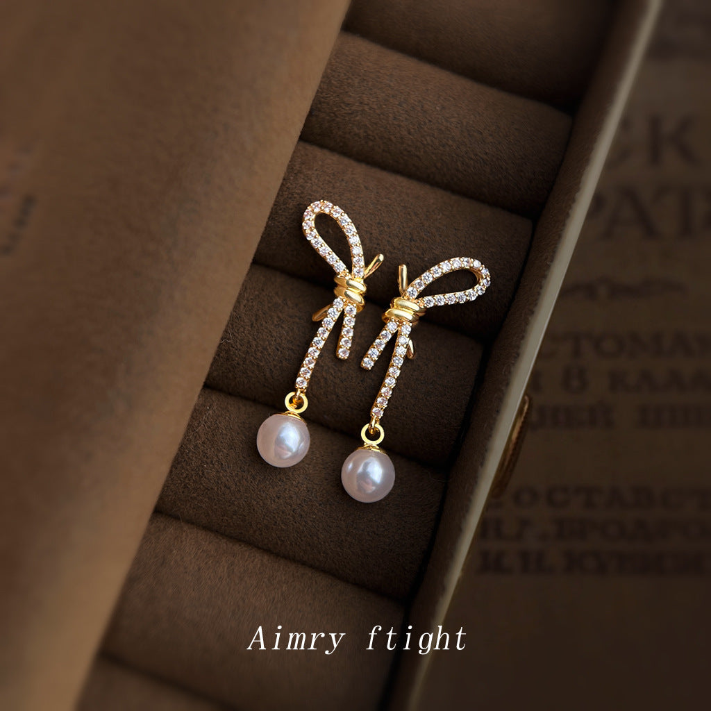 A廠【7399】原創設計鑲鋯石925銀針蝴蝶結清新甜美優雅氣質新款耳環耳環
26.03-2