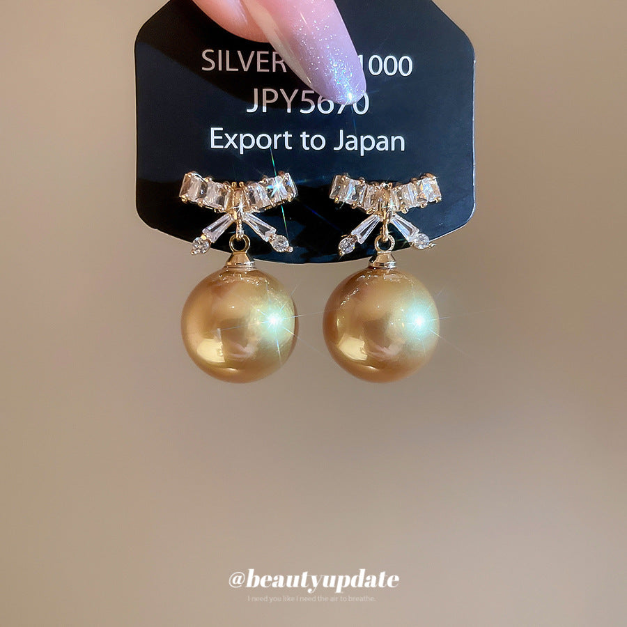 A廠【HE28881】925銀針超閃鋯石蝴蝶結香檳色珍珠耳環優雅氣質耳環輕奢高級感耳飾女
25.10-2