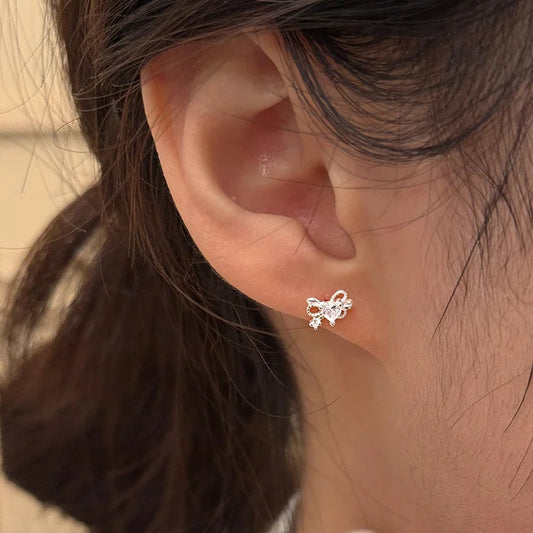 E廠【XDQ10188E】S999純銀簡約小巧蝴蝶結愛心耳環女精緻感小眾心形閃鋯耳飾潮
 25.12-1