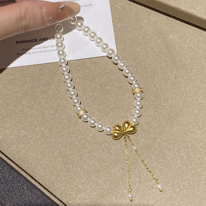 E廠【XDQ0120S】高級感小眾仿珍珠手串女S925純銀屁桃蝴蝶結流蘇手環手飾
 25.11-1