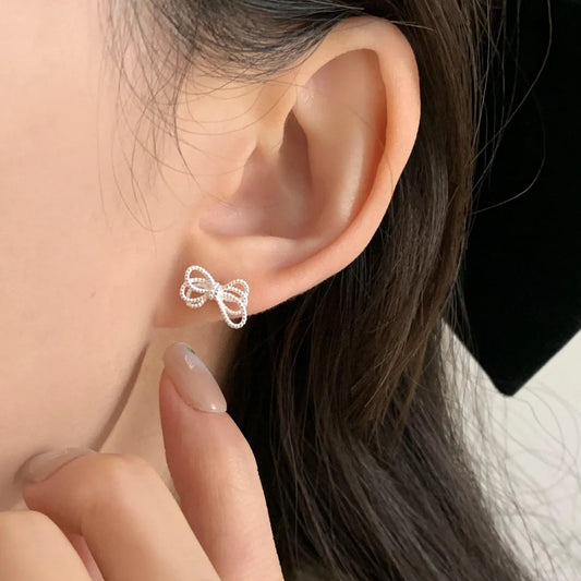 E廠【XDQ10642E】S925純銀韓版ins蝴蝶結耳環女冷淡風不規則感繩結精緻耳飾潮
 26.01-1