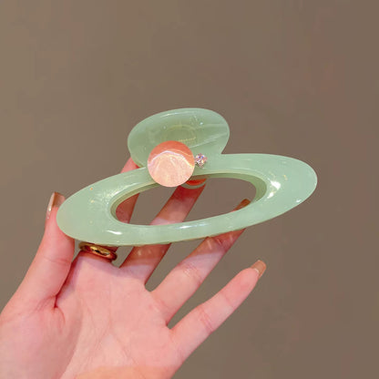 C廠【X5】高品質透綠鏤空橢圓抓夾冰透圓珠盤髮夾新款氣質後腦勺鯊魚夾髮飾
 26.03-2