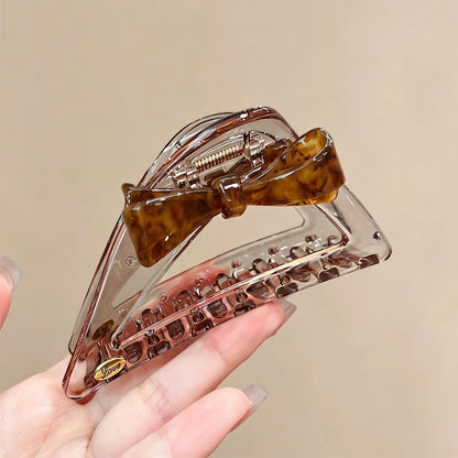 C廠【X726】三角鏤空抓夾女高級感醋酸蝴蝶結後腦勺盤鯊魚夾子夾頭飾飾
 26.08-3「C廠-單筆結帳需滿，NT$500出貨(不含運費)」