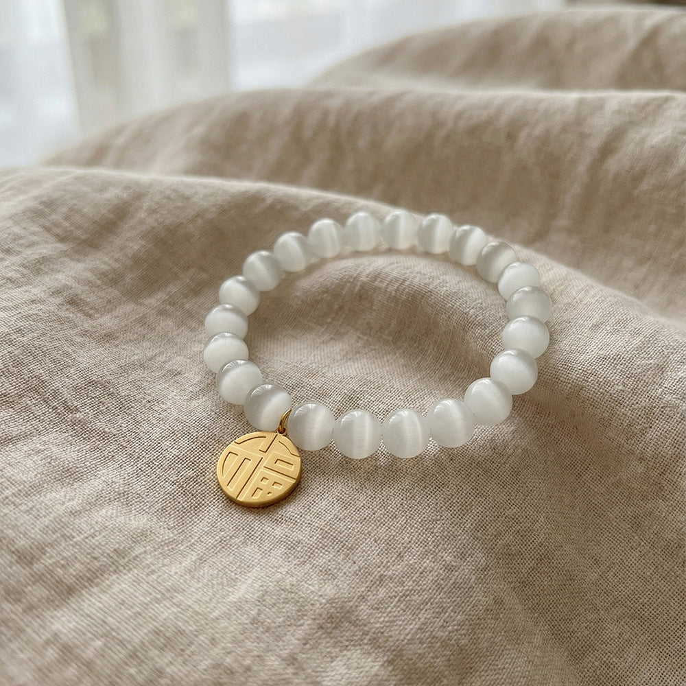 B廠【E241】歐美跨國熱銷款圓牌福字貓眼石手鍊ins風個性時尚百搭彈性繩手飾
 26.02-1