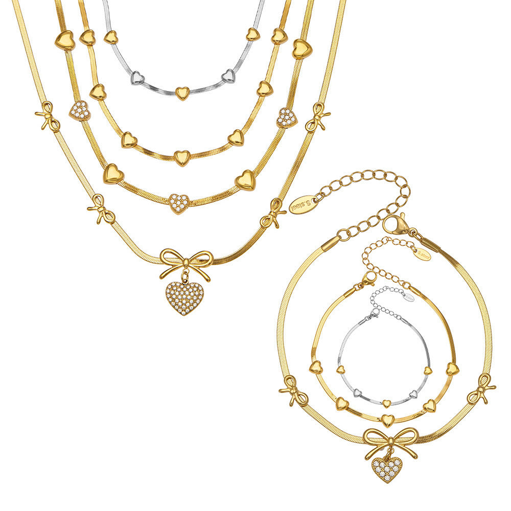 B廠【TXP499】不銹鋼蝴蝶結愛心鋯石滿鑽吊墜刀片鍊手鍊項鍊首飾組鍍18k真金
 25.11-4