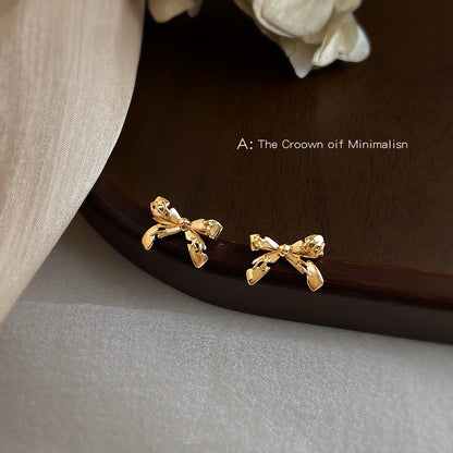 A廠【6653】設計師~原始縫合裂痕蝴蝶結925銀針鍍14K個性ins創意耳環耳飾
 25.08-5