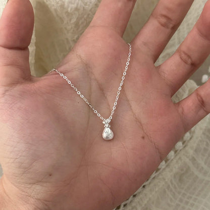 E廠【DQ1076N】S999純銀國風拉絲小福袋項鍊女精緻設計感蝴蝶結錢袋鎖骨鏈潮
 25.09-1