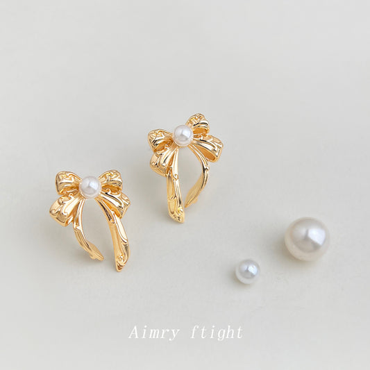 A廠【7418】原創設計師款珍珠蝴蝶結新款耳環清新甜美簡約時尚通勤高級感耳環
 26.03-2