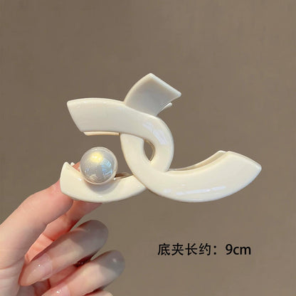 C廠【X279】高級感品質抓夾珍珠交叉時尚髮飾簡約氣質後腦勺半紮盤髮神器髮夾
 26.05-2「C廠-單筆結帳需滿，NT$500出貨(不含運費)」