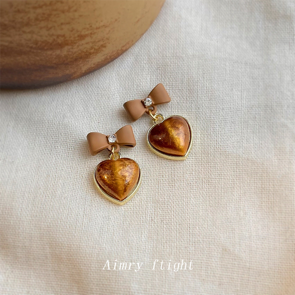 C廠【7018】秋冬熱賣美拉德風咖色大地色蝴蝶結愛心銀針耳環新款耳飾
 25.11-1