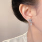 A廠【7158】原創飄雪~海藍寶鋯石925銀針雪花設計師耳環氣質個性創意新耳環
 25.11-4