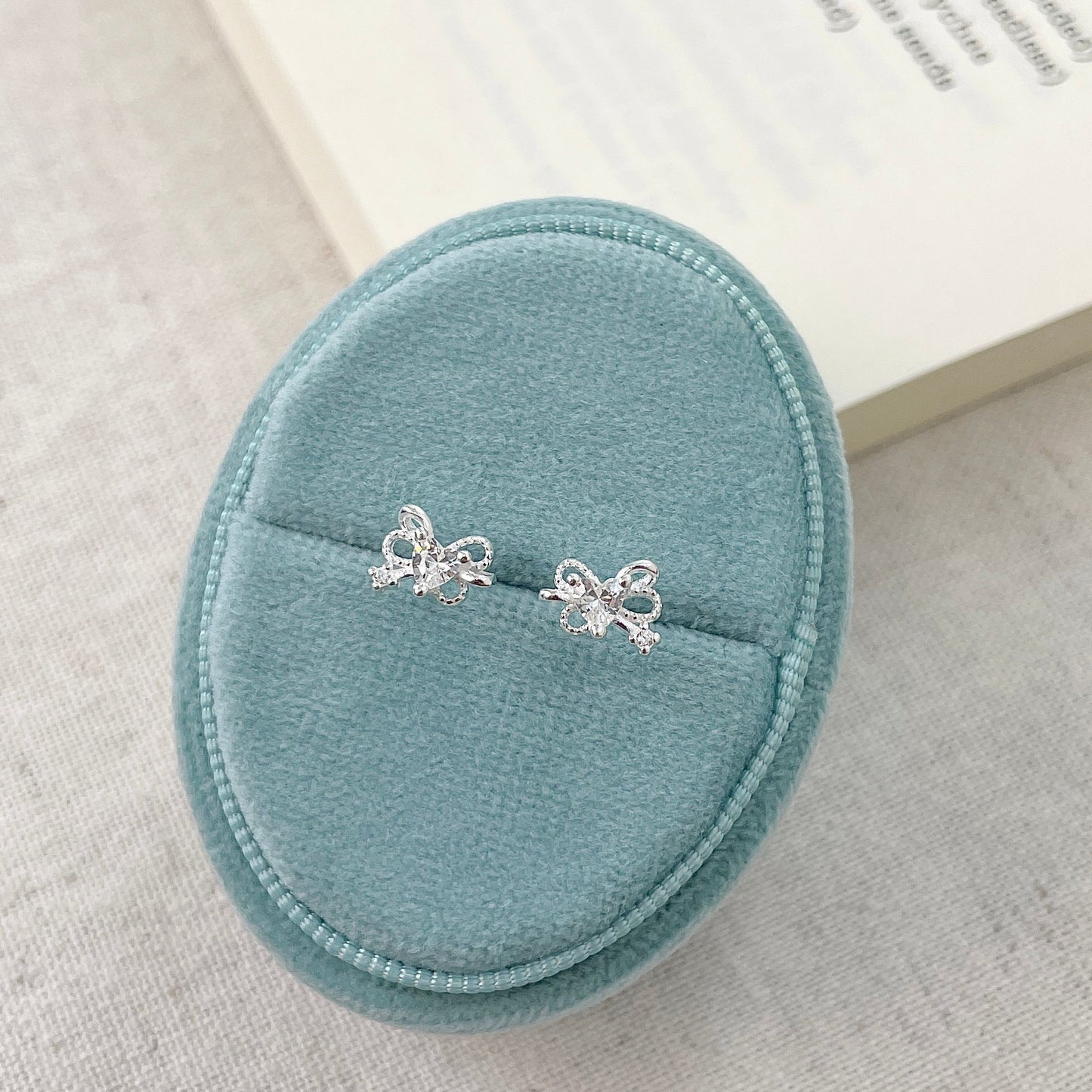 E廠【XDQ10188E】S999純銀簡約小巧蝴蝶結愛心耳環女精緻感小眾心形閃鋯耳飾潮
 25.12-1