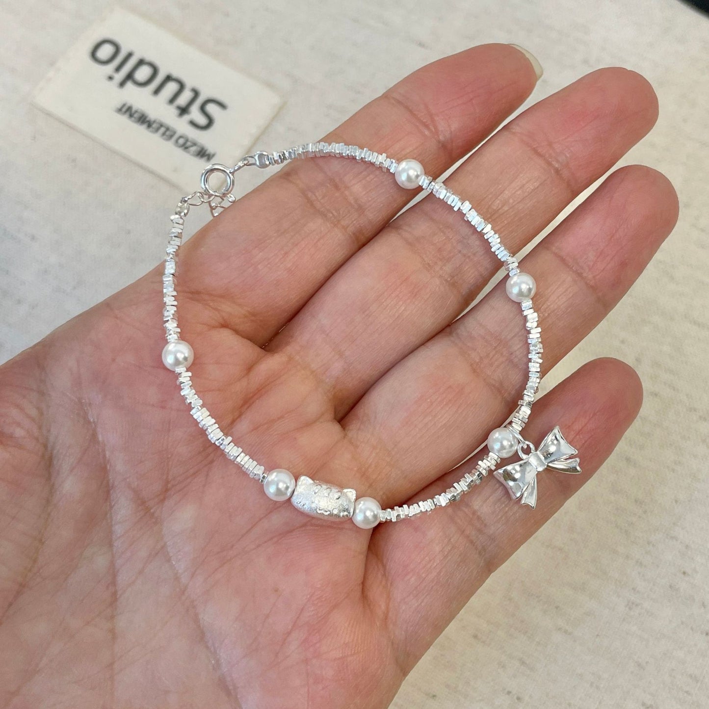 E廠【XDQ0797S】S925純銀精緻碎銀子蝴蝶結手鍊ins萌趣貓咪仿珍珠百搭手飾女
 25.11-4