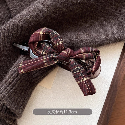C廠【Y875】秋冬格紋蝴蝶結一字抓夾女2025新款高級感扭扭髮夾盤發大號鯊魚夾
 25.12-2「C廠-單筆結帳需滿，NT$500出貨(不含運費)」