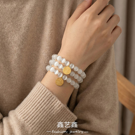 B廠【E241】歐美跨國熱銷款圓牌福字貓眼石手鍊ins風個性時尚百搭彈性繩手飾
 26.02-1
