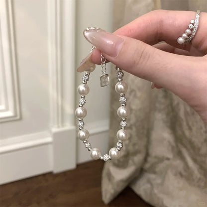 E廠【DQ0548S】法式高級感施家仿珍珠手鍊女S925純銀爆閃圓珠精緻手飾品百搭 25.07-2