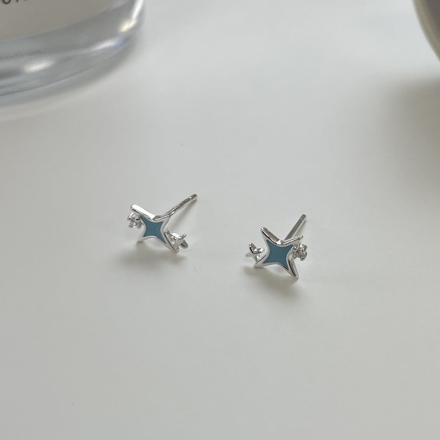 F廠【XDQ11087E】簡約小清新藍色星星耳環女S999純銀高級感小巧四芒星百搭耳飾
 25.11-1