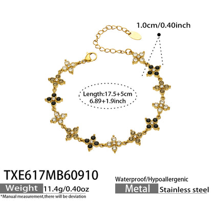B廠【TXP617】跨境時尚四瓣花鋯石鈦鋼PVD真空電鍍小眾高級鎖骨鏈耳環手鍊組合
 26.09-3