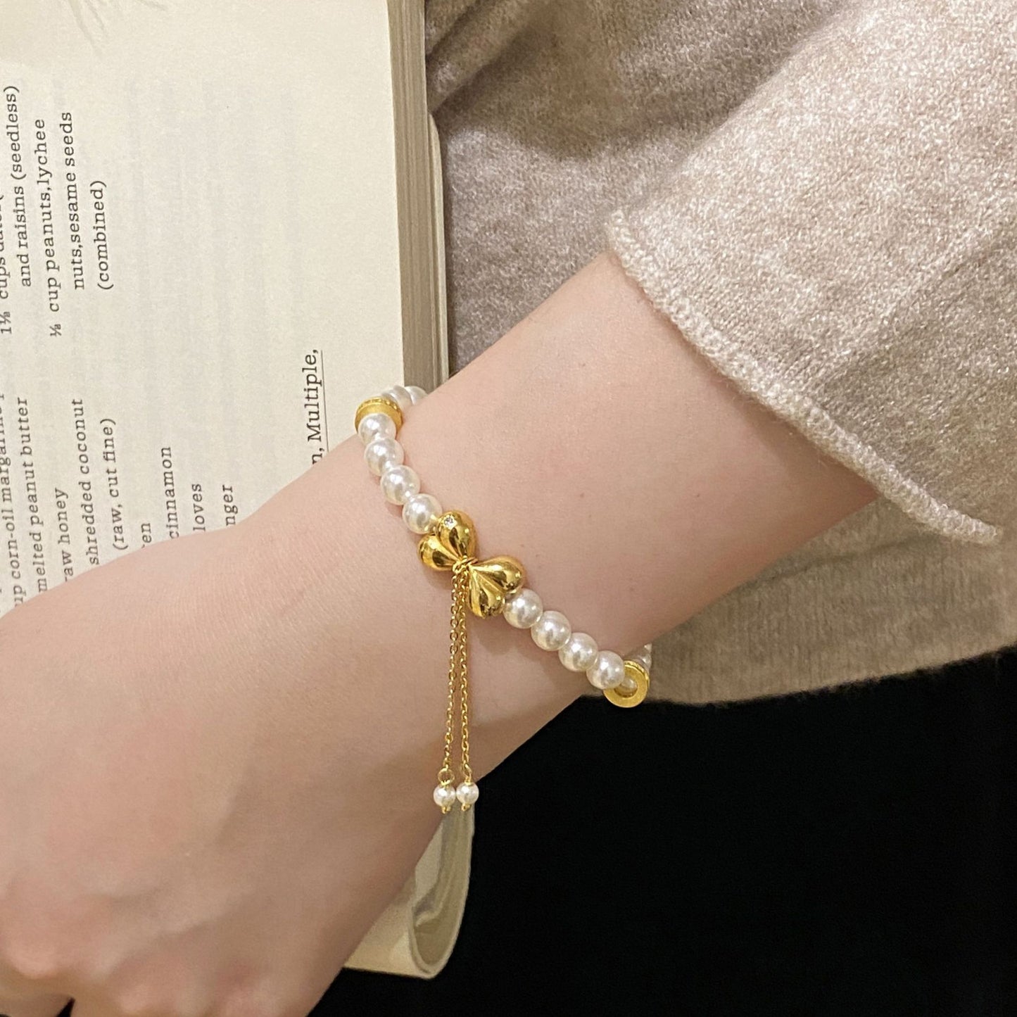 F廠【XDQ0120S】高級感小眾仿珍珠手串女S925純銀屁桃蝴蝶結流蘇手環手飾
 25.11-1