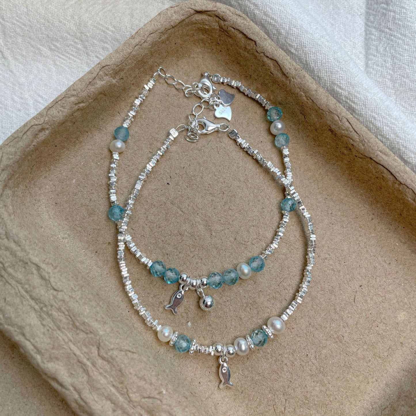 E廠【XDQ0060S】小眾精緻S925純銀藍托帕小魚手鍊女輕奢碎銀子氣質百搭手飾品
 26.04-3