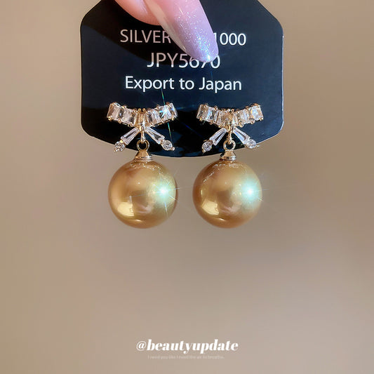 A廠【HE28881】925銀針超閃鋯石蝴蝶結香檳色珍珠耳環優雅氣質耳環輕奢高級感耳飾女
 25.10-2