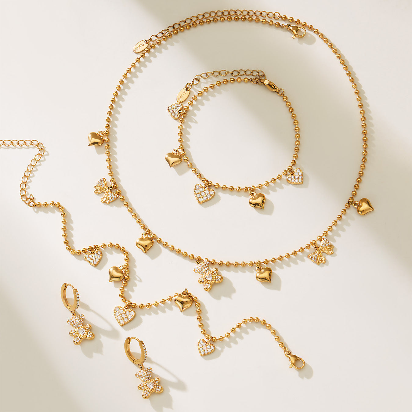 B廠【TXP500】不銹鋼5A鋯石滿鑽小熊蝴蝶結愛心多配件吊墜項鍊手鍊耳環首飾套裝
 25.11-4