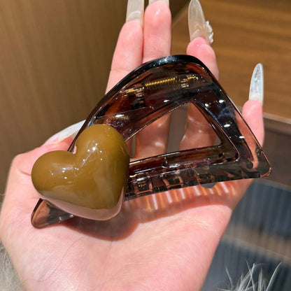 C廠【X785】韓國愛心三角抓夾女高級感鏤空高品質鯊魚夾子後腦勺盤髮通勤髮夾
 26.08-4「C廠-單筆結帳需滿，NT$500出貨(不含運費)」