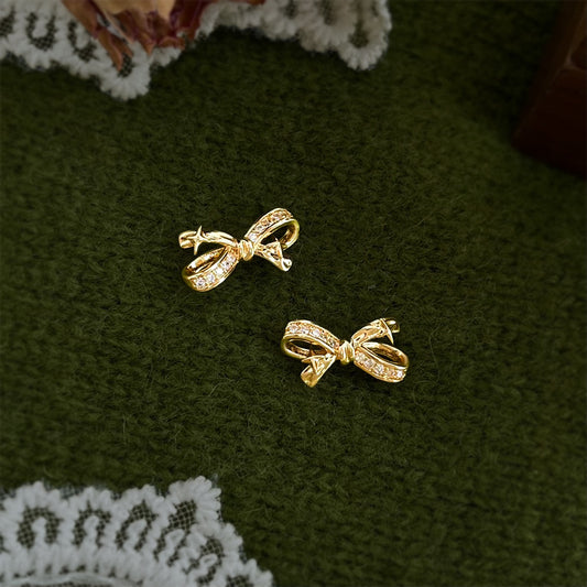 A廠【7255】原創芒星微鑲鋯石蝴蝶結鍍銀針耳環創意新款輕奢風高級感耳飾
 26.03-3