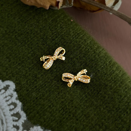 A廠【7255】原創芒星微鑲鋯石蝴蝶結s925銀針耳環創意新款輕奢風耳飾飾品
 25.12-3