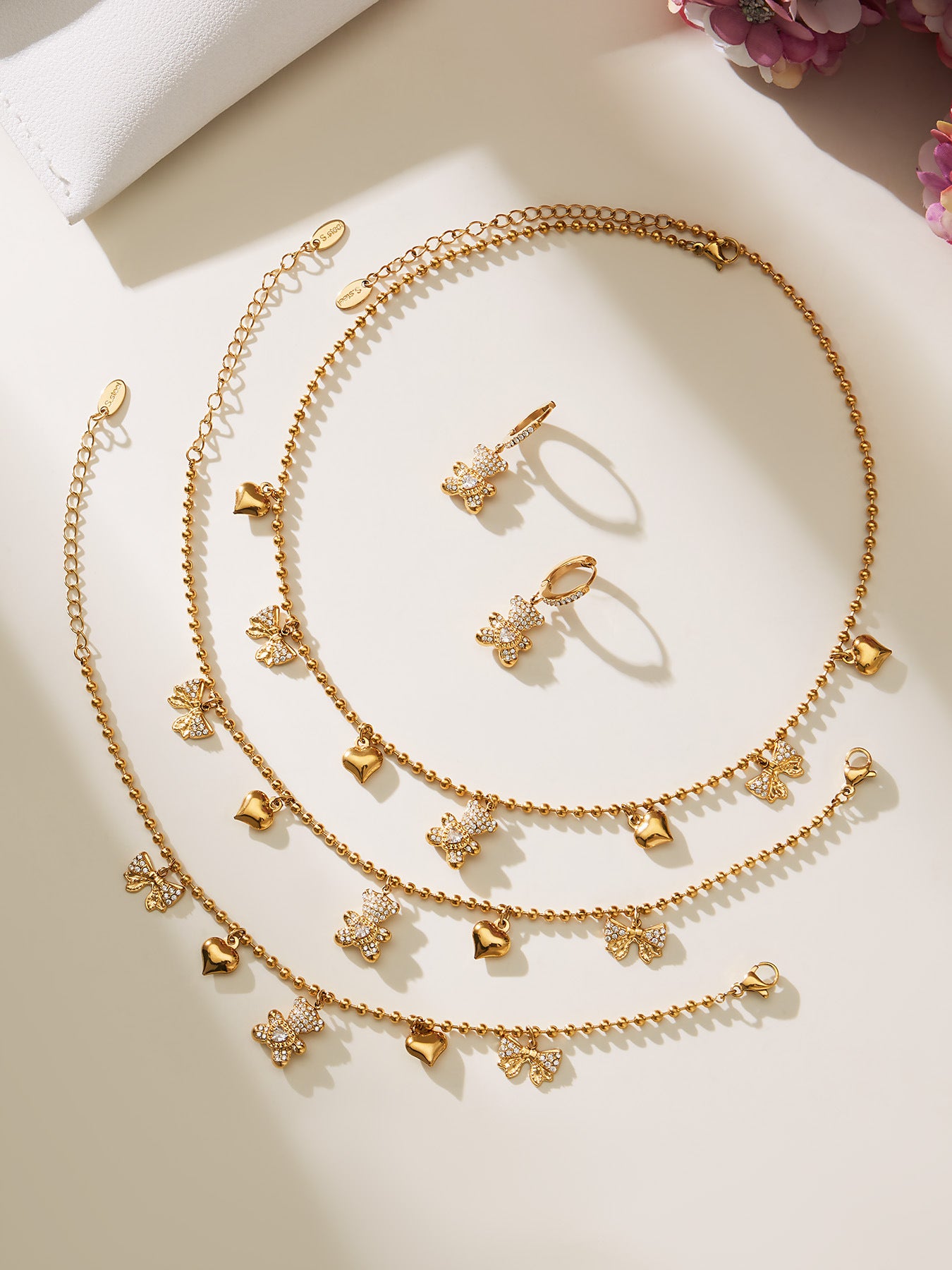 B廠【TXP500】不銹鋼5A鋯石滿鑽小熊蝴蝶結愛心多配件吊墜項鍊手鍊耳環首飾套裝
 25.11-4